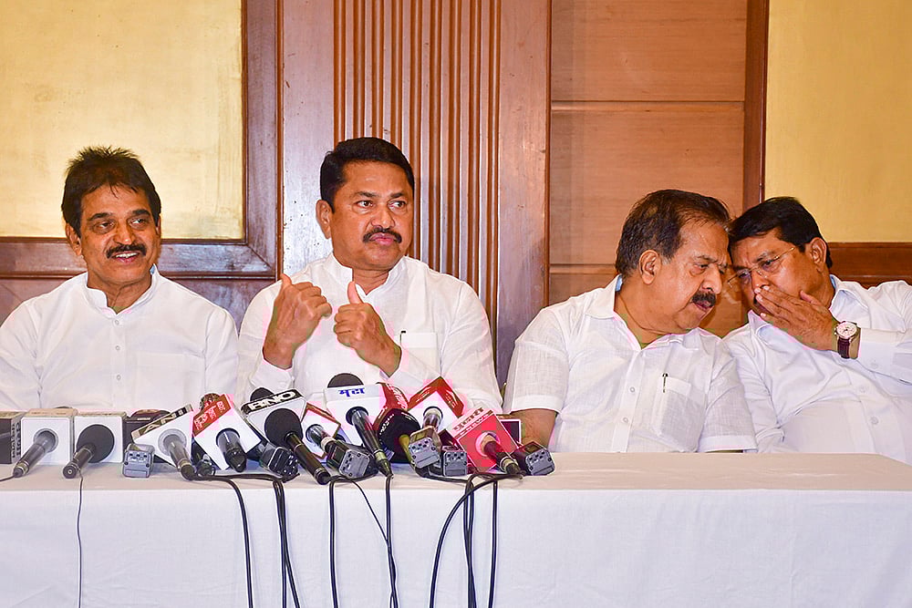| Photo: PTI : KC Venugopal (L), Maharashtra observer Ramesh Chennithala (2nd R) and State Congress President Nana Pathole (2nd L) at a press conference in Mumabai